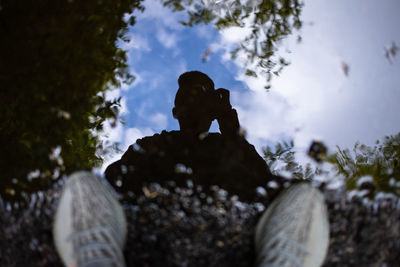 Low angle view of statue against sky