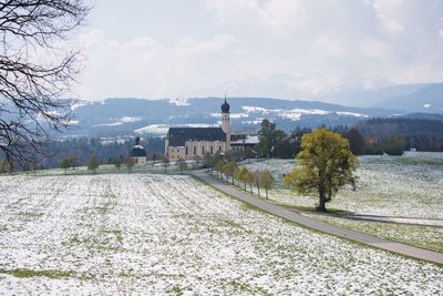 View of railroad tracks against sky during winter