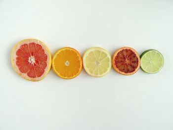 Various fruits on white background