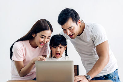 Happy mother and son at home