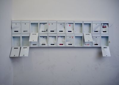 Close-up of computer mounted on wall