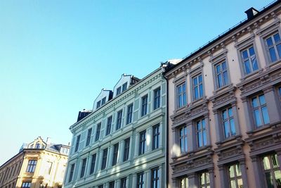 Low angle view of building against blue sky