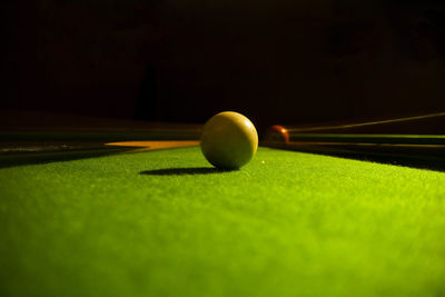 Close-up of cue balls on table