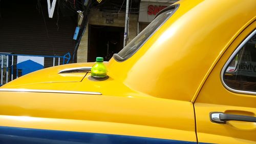 Close-up of yellow car