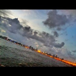 View of river against cloudy sky