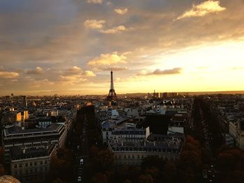 High angle view of city buildings during sunset