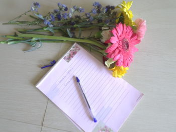 High angle view of purple flower on table