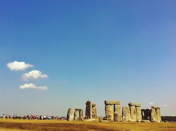 Scenic view of landscape against blue sky