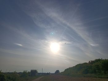 Scenic view of field against sky during sunset