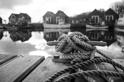 Close-up of rope tied on wooden post