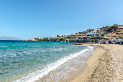 View of beach against blue sky