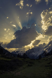 Scenic view of field against sky during sunset