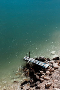 High angle view of pier at beach 