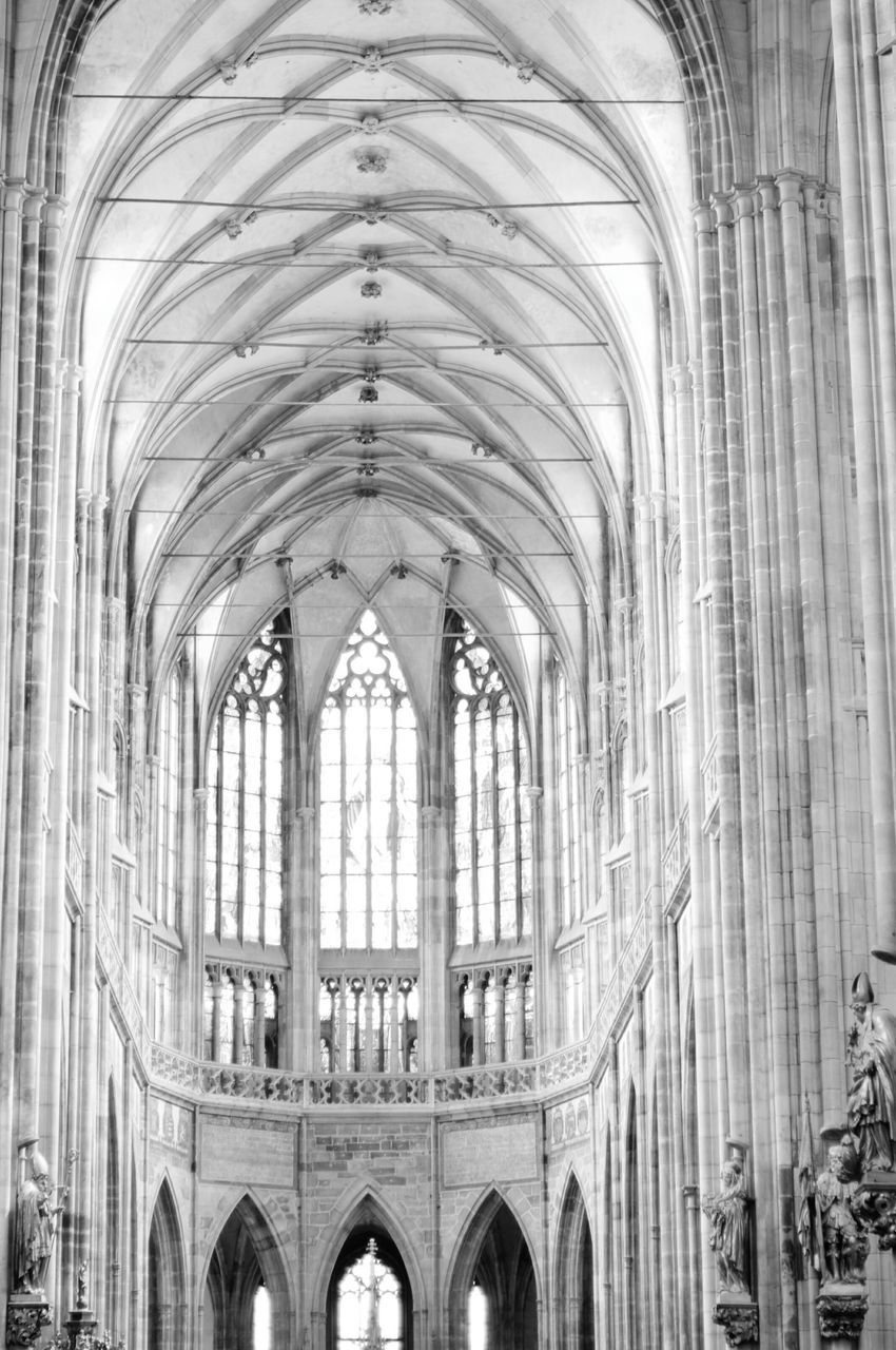 arch, indoors, place of worship, religion, church, spirituality, architecture, built structure, cathedral, interior, history, architectural column, ceiling, famous place, low angle view, travel destinations, window, architectural feature