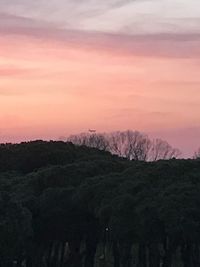 Scenic view of landscape against sky during sunset