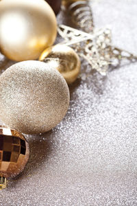 Close-up of christmas decorations on table