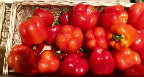 Close-up of red bell peppers in basket