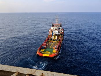 High angle view of ship in sea against sky