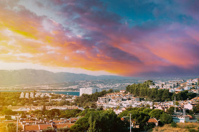 High angle view of townscape against sky during sunset