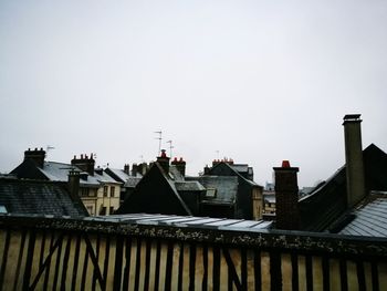 Houses against clear sky