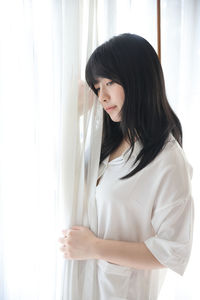 Young woman looking away