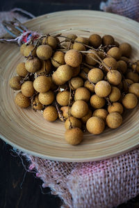 High angle view of eggs in basket on table