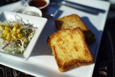 High angle view of breakfast served on table
