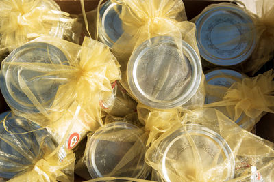 High angle view of top of canned goods in glass containers