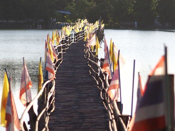 Wooden posts in river