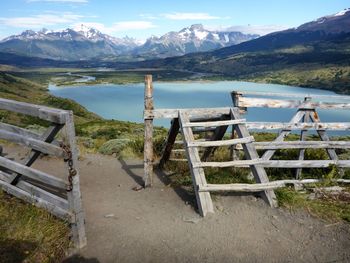 Scenic view of landscape and mountains against sky