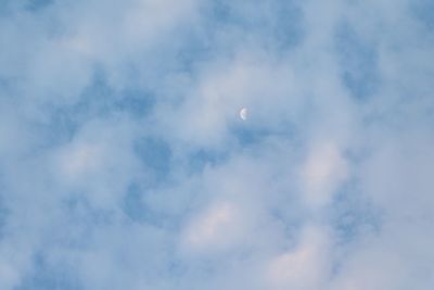 Low angle view of moon against sky