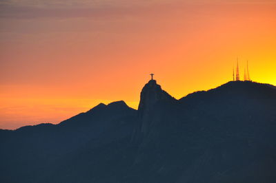 Scenic view of mountains at sunset