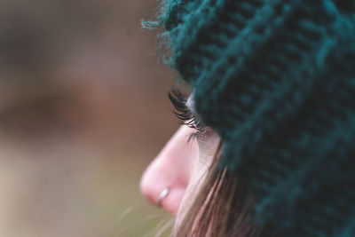 Close-up of woman looking away outdoors