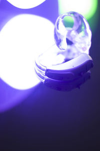 High angle view of illuminated lighting equipment on table