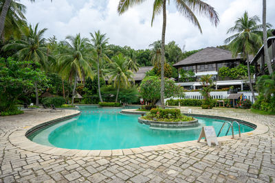 Panoramic view of swimming pool against sky