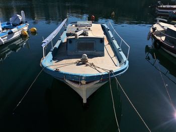 High angle view of boats moored in lake