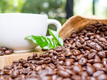 Close-up of coffee beans on table