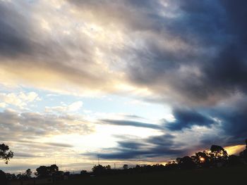 Scenic view of dramatic sky during sunset