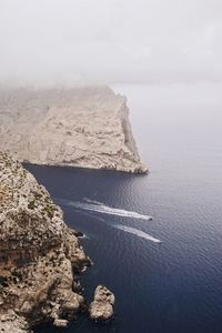 High angle view of rock formation in sea