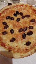 Close-up of pizza in plate on table