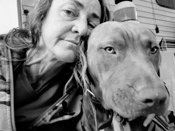 Portrait of woman with dog