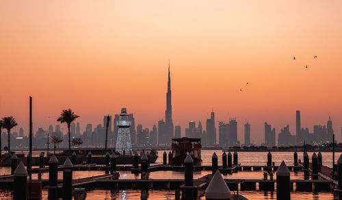 View of buildings against sky during sunset