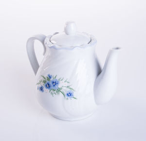 Close-up of teapot against white background