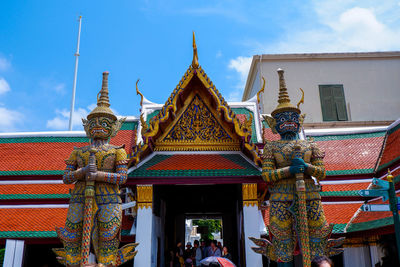 Low angle view of temple against building