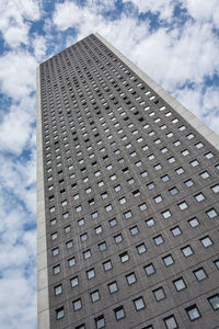 Low angle view of skyscraper against sky