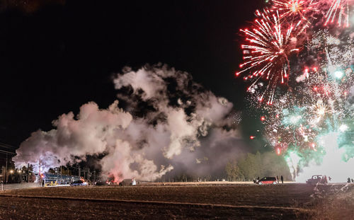 Firework display at night