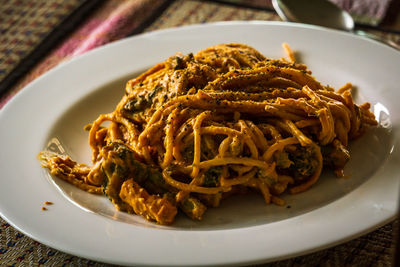 High angle view of noodles in plate on table