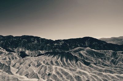 Scenic view of desert against clear sky