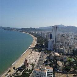 View of cityscape with sea in background