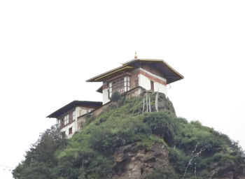 Low angle view of house against clear sky